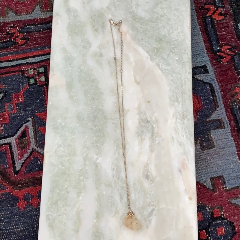 Gold necklace with quartz pendant